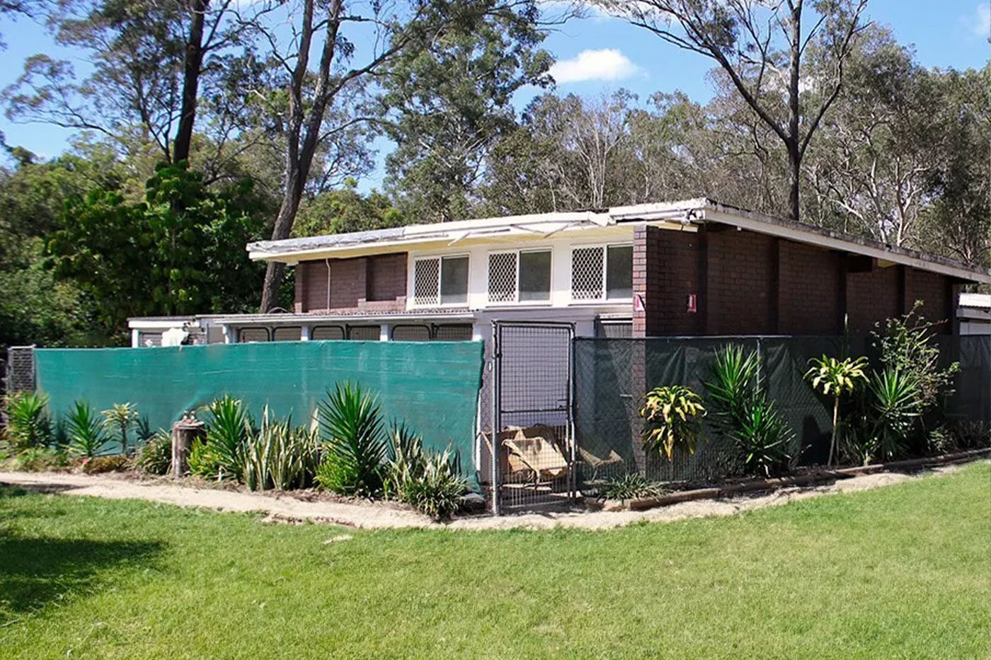 The outside of a Dolittles dog kennel.